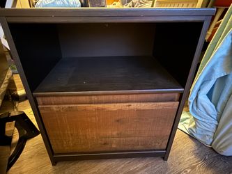 Wooden nightstand with storage drawer