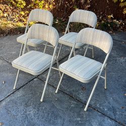 4 Upholstered Folding Chairs