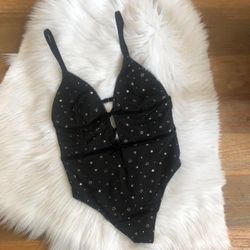 Black star mesh bodysuit, brand new