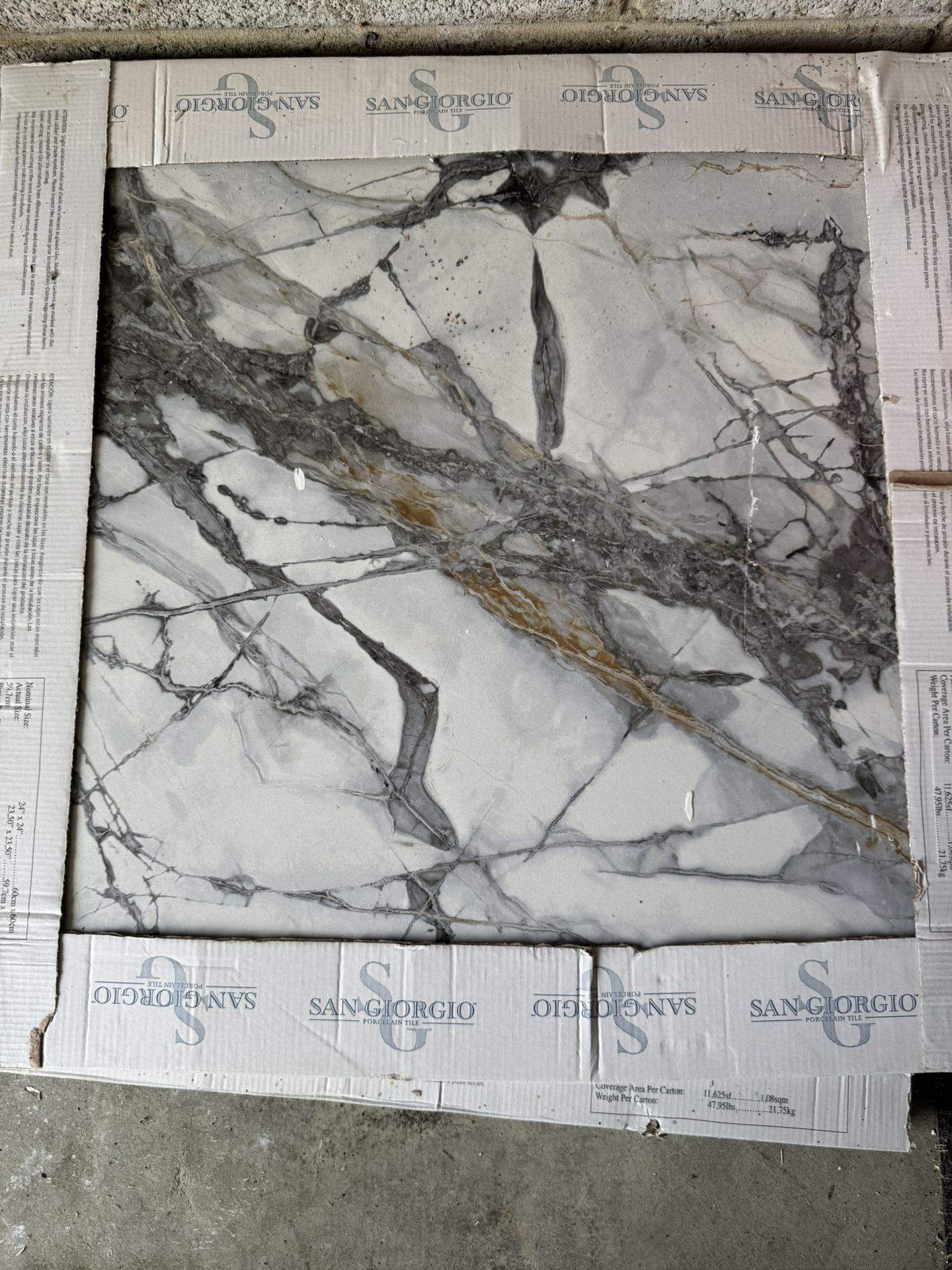 5 Square Ft Of 24by24 Tile Also Four Bags Of Grey Mortor And One Bag Of White