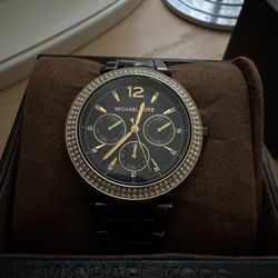 Michael Kors Parker black ion-plated stainless steel watch with a rhinestone-set bezel