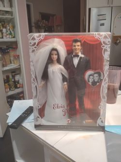Elvis and Priscilla dolls