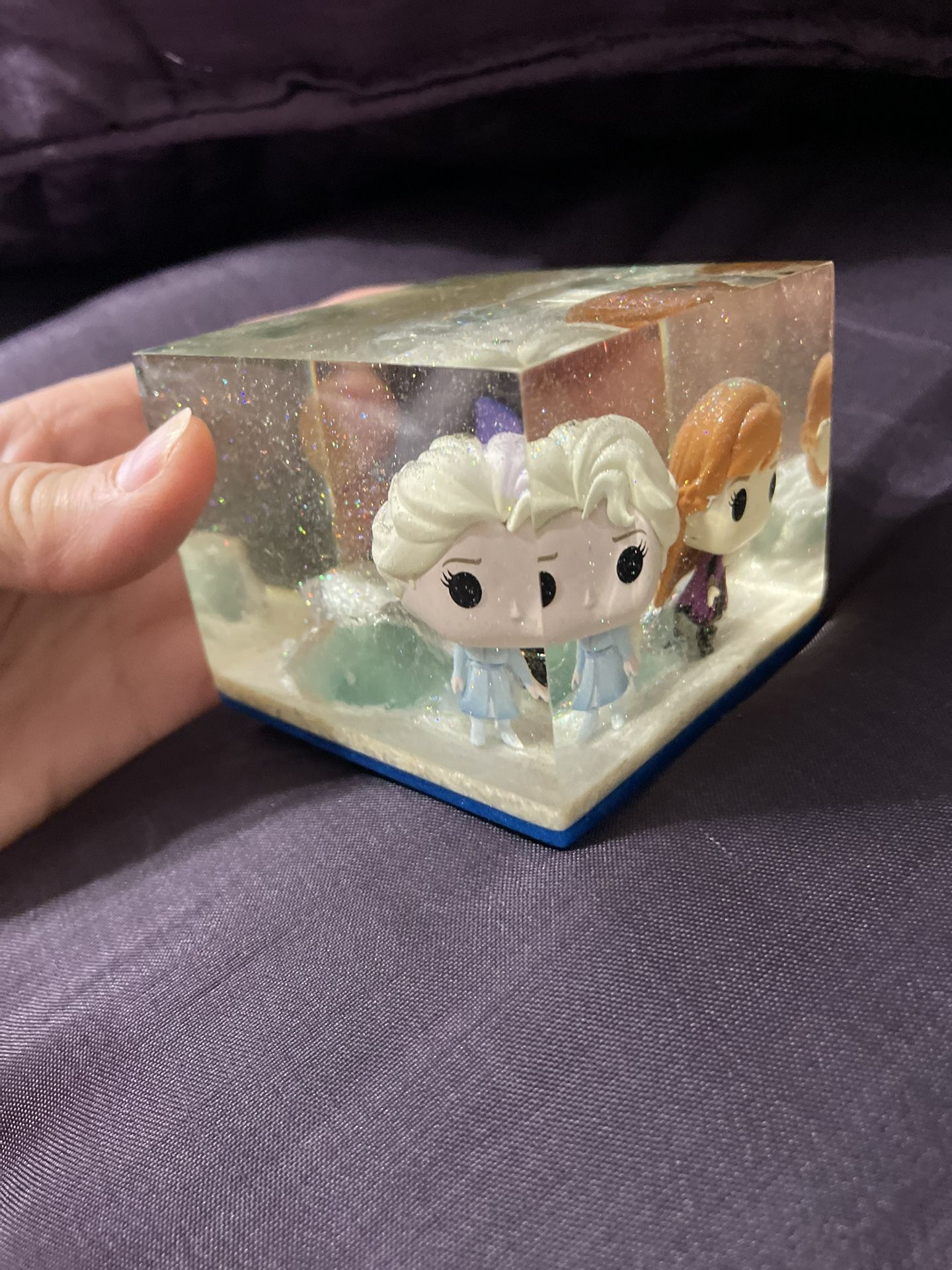 Handmade a clear Cube Encasing “ Frozen 2” Funko Pop Figurines of Elsa and Anna.