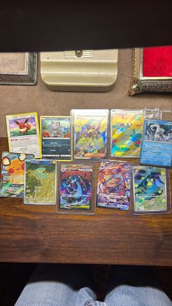 Pokemon cards Charizard umbreon pikachu