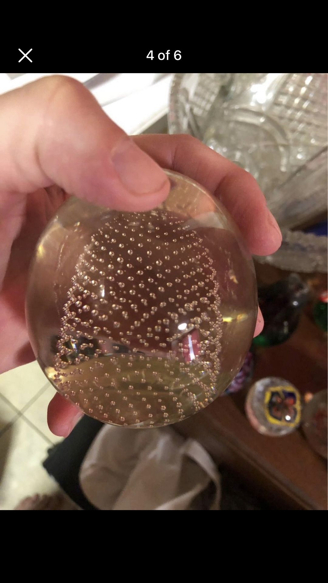 Vintage clear glass paperweight with controlled bubble piece inside