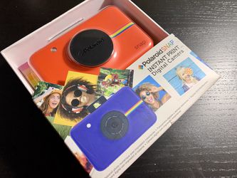 Brand new! Polaroid Snap Instant Digital Camera (Red) with ZINK Zero Ink Printing Technology