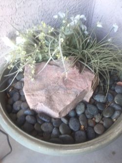 Large planter water fountain. New pump. Works great. Relaxing sounds.