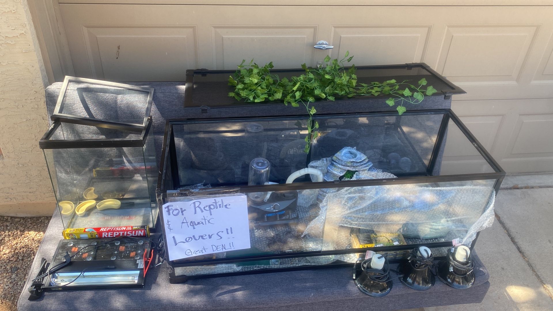 Big Reptile Tank With Real Nice Accessories And Small Fish Tank