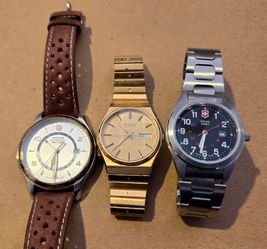 3 quartz watch lot: Seiko SQ, Wenger Swiss Military GMT,  Swiss Army quartz