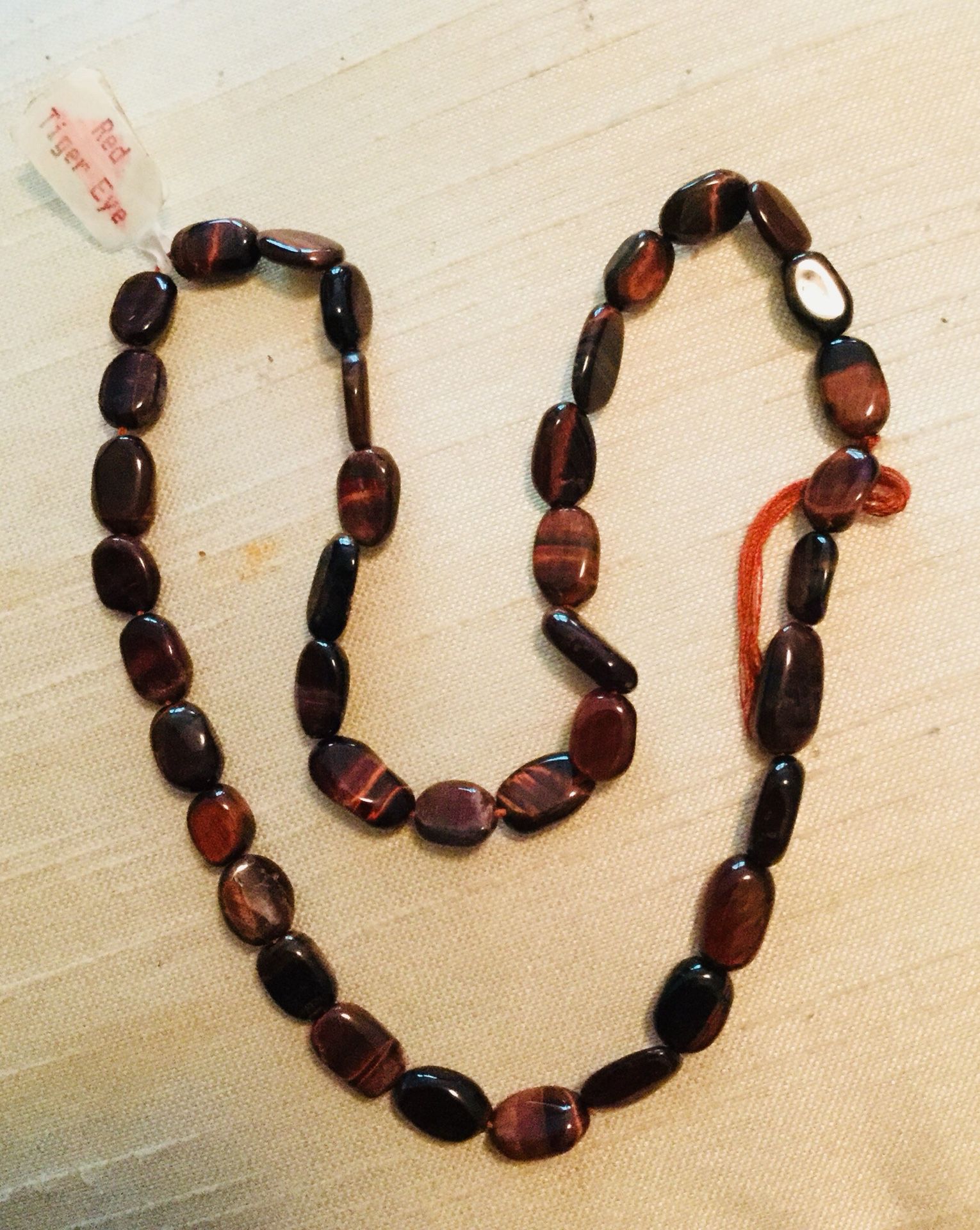 Gem quality beads, red Tigereye