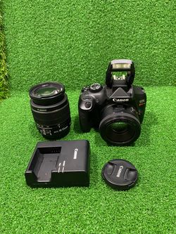 Canon EOS Rebel DSLR Camera with Two Lenses