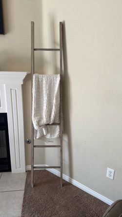 Gray rustic ladder