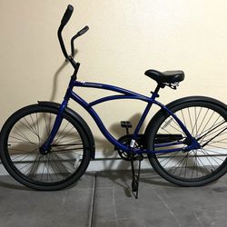Blue Huffy Cruiser Bike