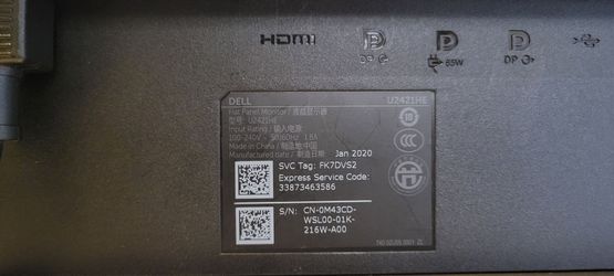 Dell UltraSharp U2421HE flat panel monitor.