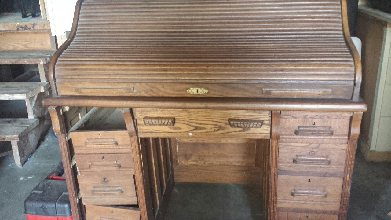 Antique oak roll top desk secretary size 44 in tall x 47 in wide coming apart on the left side drawer wall needs to be put together