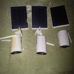 Four Security Cameras With Solar Screens