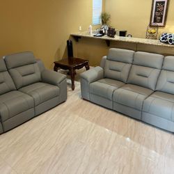 New Reclining Couch / Love Seat . Light Grey Leather Free Delivery !