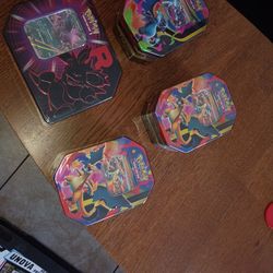 Team rocket tin n charzard tin