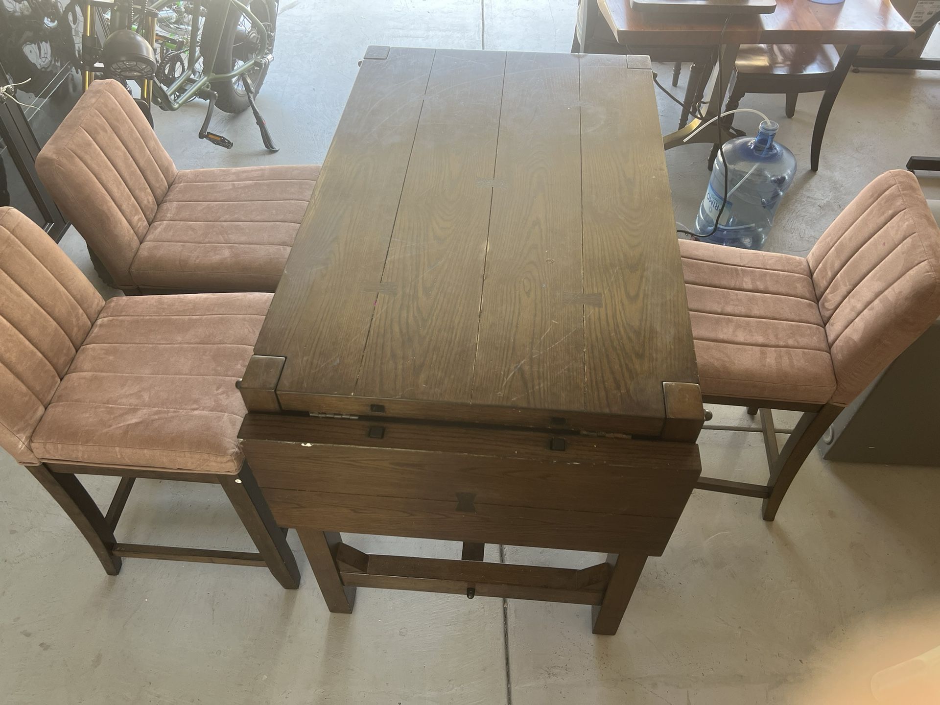 Solid wood dining table. Three solid wood and leather chairs