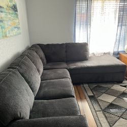 Grey Sectional Couch With (full Size Bed ) Pull Out Bed.