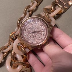 Michael Kors Twisted Rose Gold Watch And Bracelet