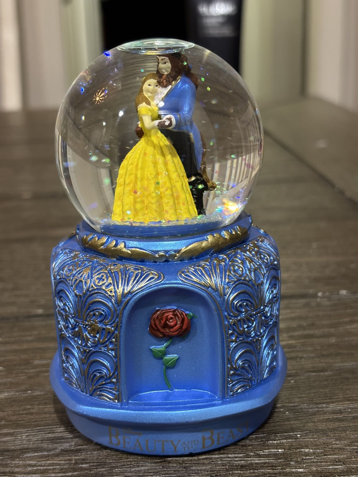 Collectible beauty and the beast snow globe.