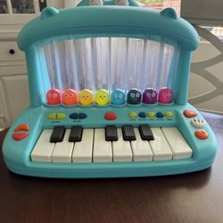 B. Piano Toy