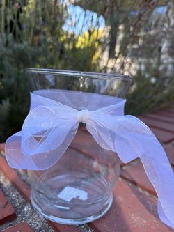 Glass vase with ribbon