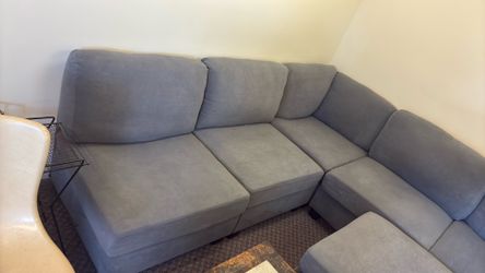 L shaped couch with ottoman ￼