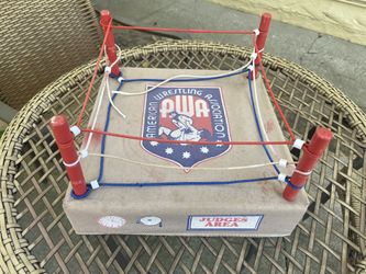 Vintage 1985 American Wrestling Association (AWA) wrestling ring (price $40) part of rope broken