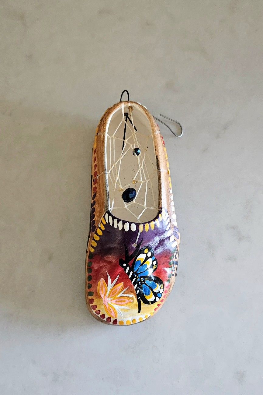 Native American art-inspired moccasin Christmas ornament.