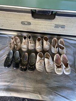 Eight Pair Of Baby Shoes.