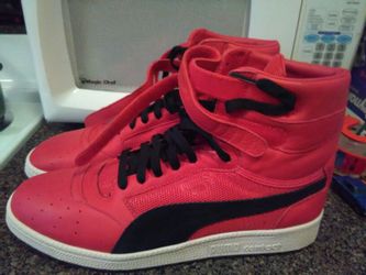 Brand new never worn puma leather hi tops size 11