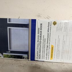 New Garage Door in the box. Item was purchased at Lowe’s .