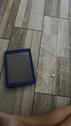 iPad 6th generation with charger and case