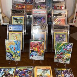 11 Pokemon slabs 4 MEP promos and 40 singles vintage/ ex/ v and vstar singles
