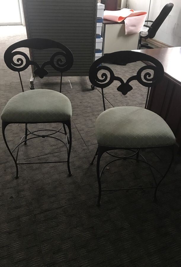 Pair of Solid metal design chairs