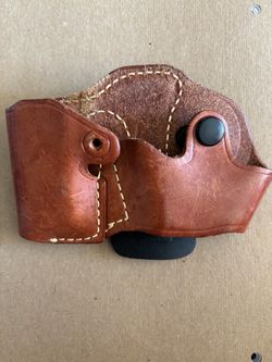 Handcuff and magazine pouch