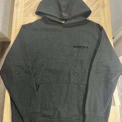 Fear of God ESSENTIALS logo-print hoodie in black