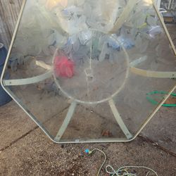 Price is firm.. beautiful decorative glass patio table