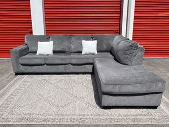 Ashley Sectional sofa bed (Delivery Available)