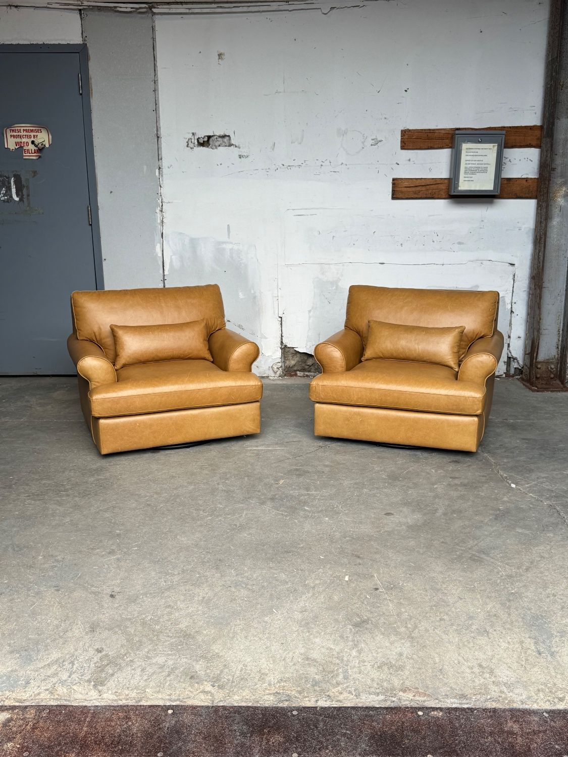 Warm Brown Leather Swivel Chair (Retail $1795)