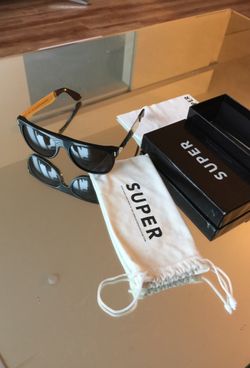 Super gold and black sunglasses like new everything included papers box cloth