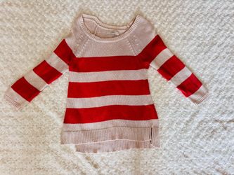 Orange and beige striped sweater, size medium.
