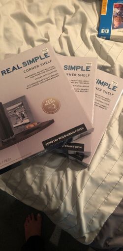 3 Brand new in box corner shelves