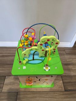 Wooden activity center for toddler