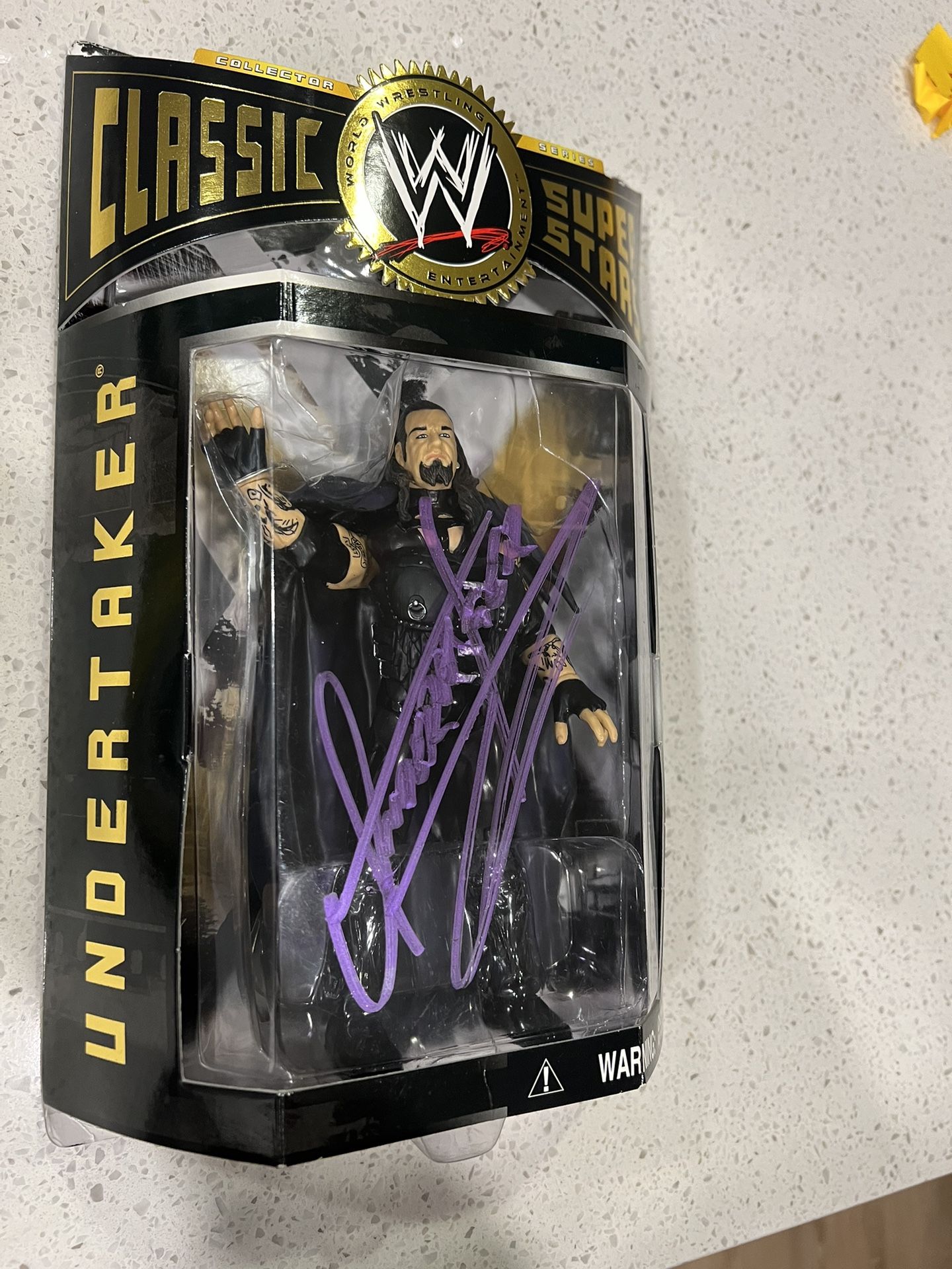 Autographed Classic super Stars Action figure “Undertaker”