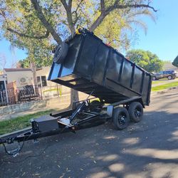 BRAND NEW DESIGN DUMP TRAILER 12x8x4 12,000 LBS ROLLING TARP AND SPARE TIRE HYDRAULIC SYSTEM ELECTRIC BRAKES TITLE IN HAND FOR ANY QUESTION TEXT ME PL
