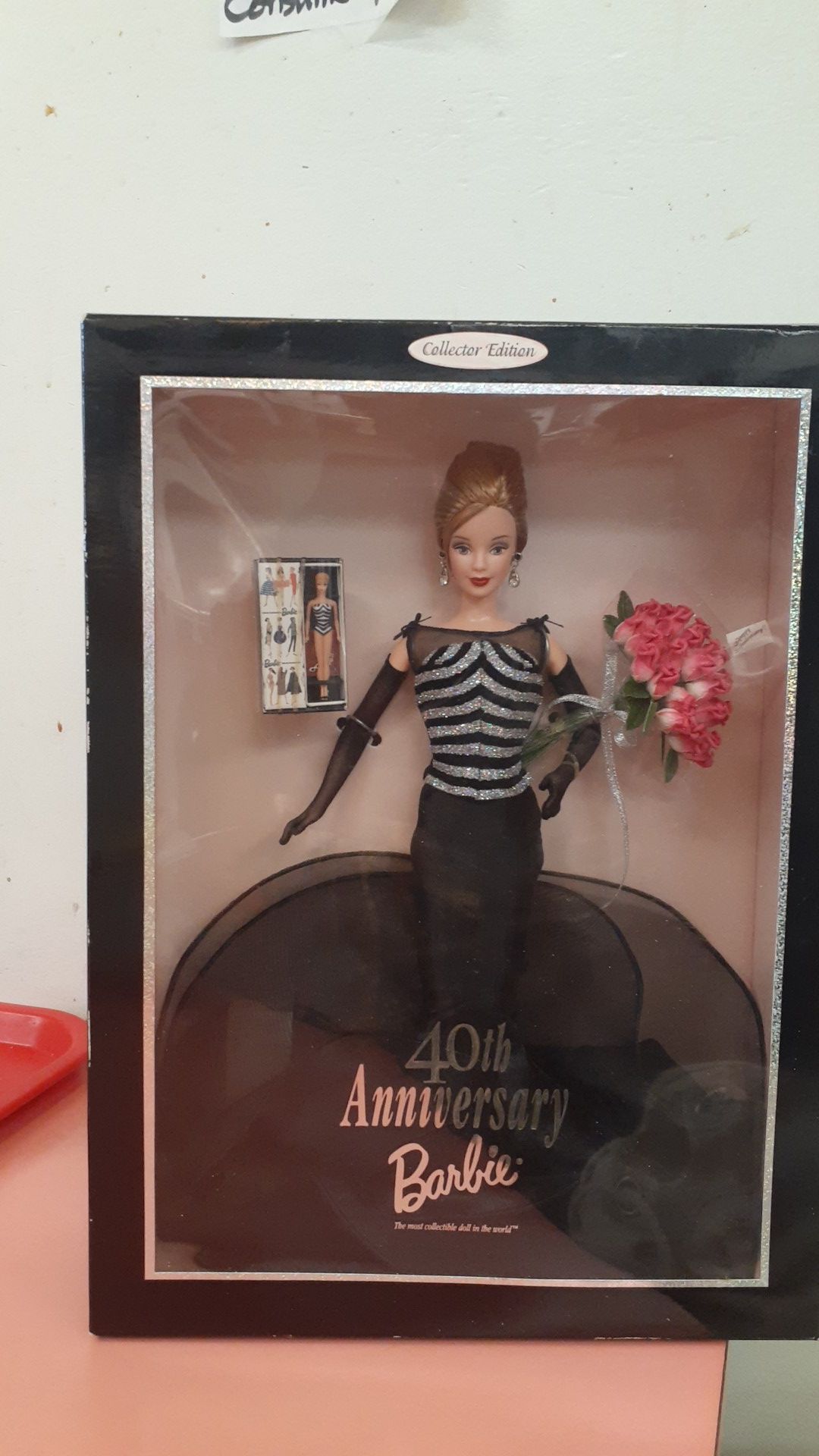 She is a collectible and the little teeny doll that's in the pack is the original Barbie from 1954 And I Have Other Barbie Dolls As Well That Are Coll