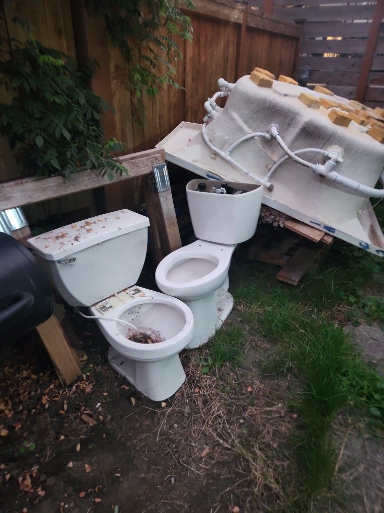 Toilet, Jacuzzi Tub And Wood. All Free U Haul